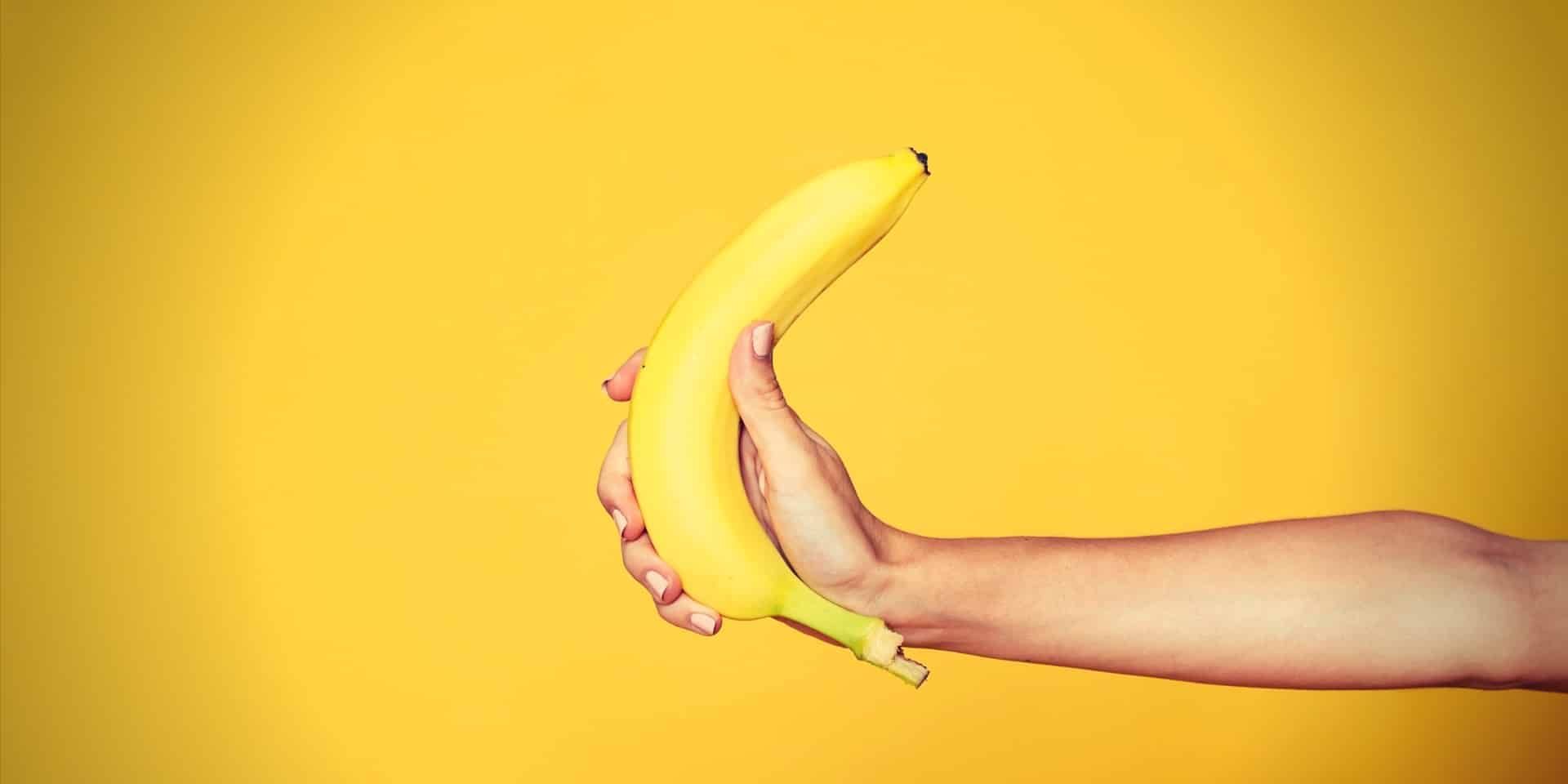 Instant Erection female hand holding banana